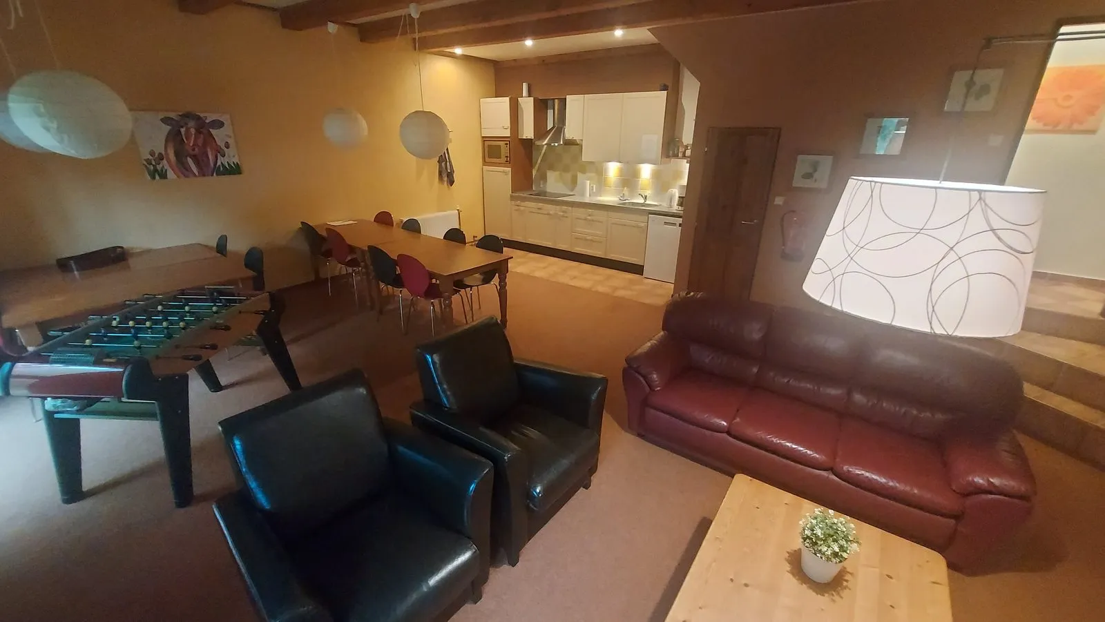 De gezamenlijke keuken en zithoek boven bij B&B Náš Dům